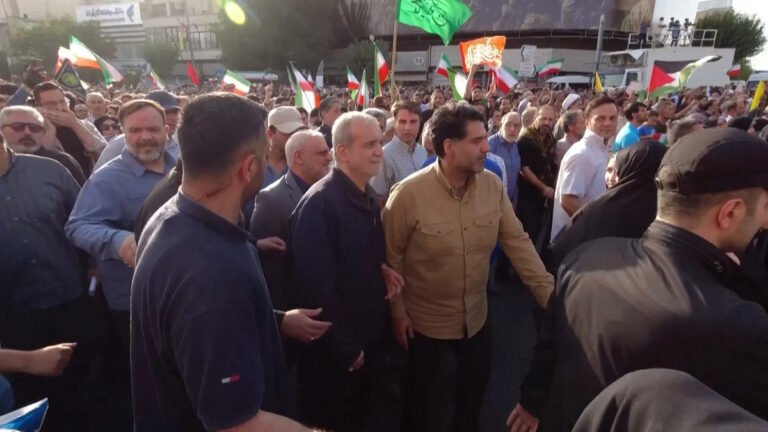 Iran President Pezeshkian Joins Tehran Rally Amid US-Israeli Strikes